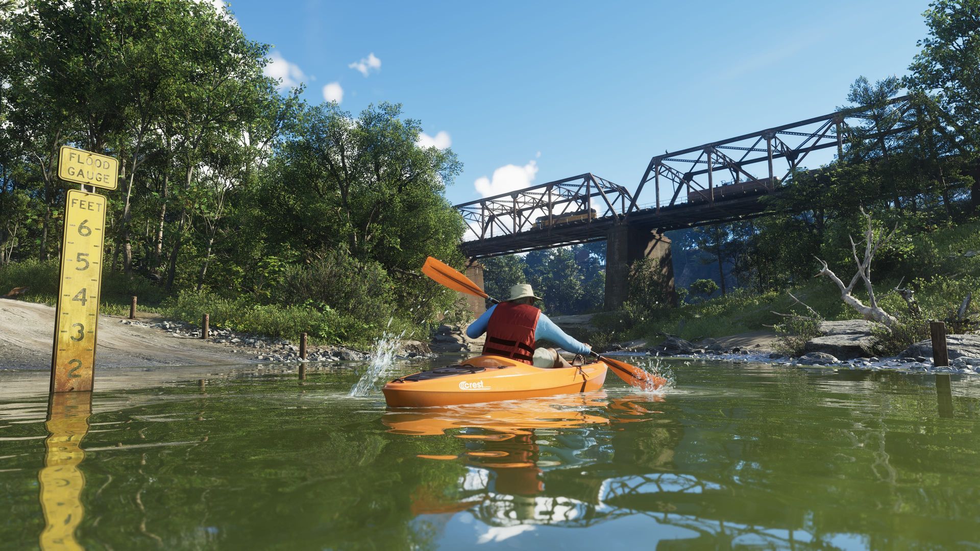 Ein Kajakfahrer paddelt einen Fluss unter einer Stahlbrücke entlang