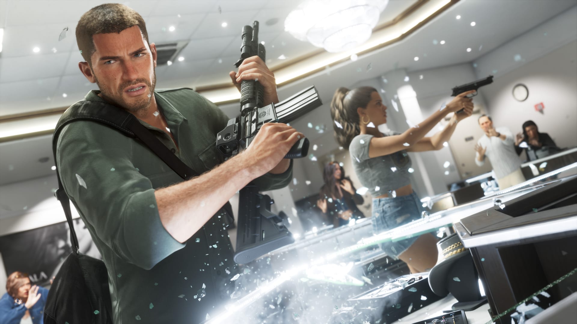 Jason and Lucia rob a jewellery store: he smashes a display case with a rifle while she holds staff at gunpoint, glass shards and jewellery flying through the air